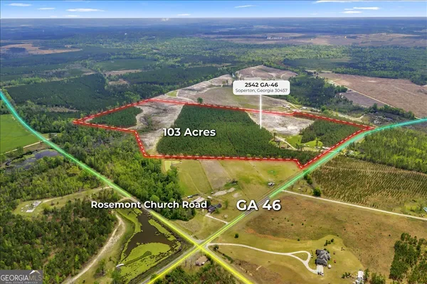 a view of a lake with a sign board