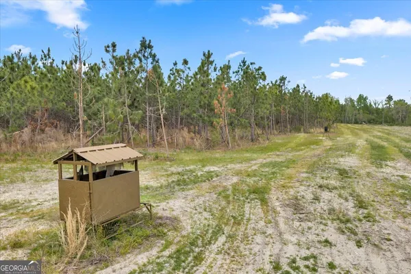 a view of lake with mountain