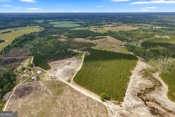 a view of a lake in a yard