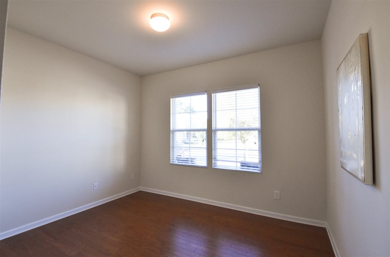 4201 Kellett Lane Raleigh, NC 27616 - Photo 12 of 30 1st floor Bedroom or Office w/lg closet, hardwood floor & adjacent full Bath. Main Flr Bedroom 5/Office