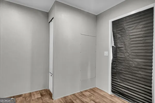 a kitchen with stainless steel appliances a stove a sink and cabinets