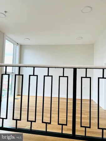 a view of staircase with window