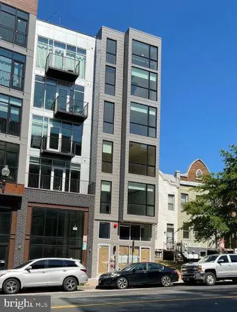 a view of a building and a street