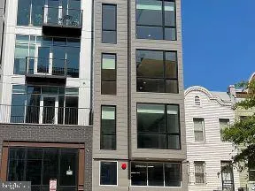 a front view of a multi story building