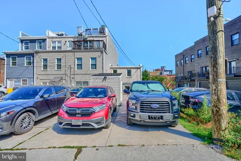 a car parked in front of a house