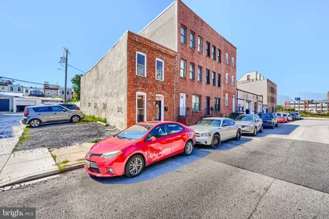 a cars parked in front of a building