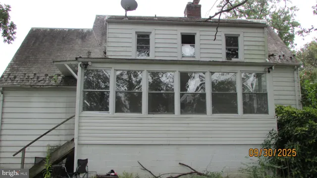 a black and white building with a outdoor space