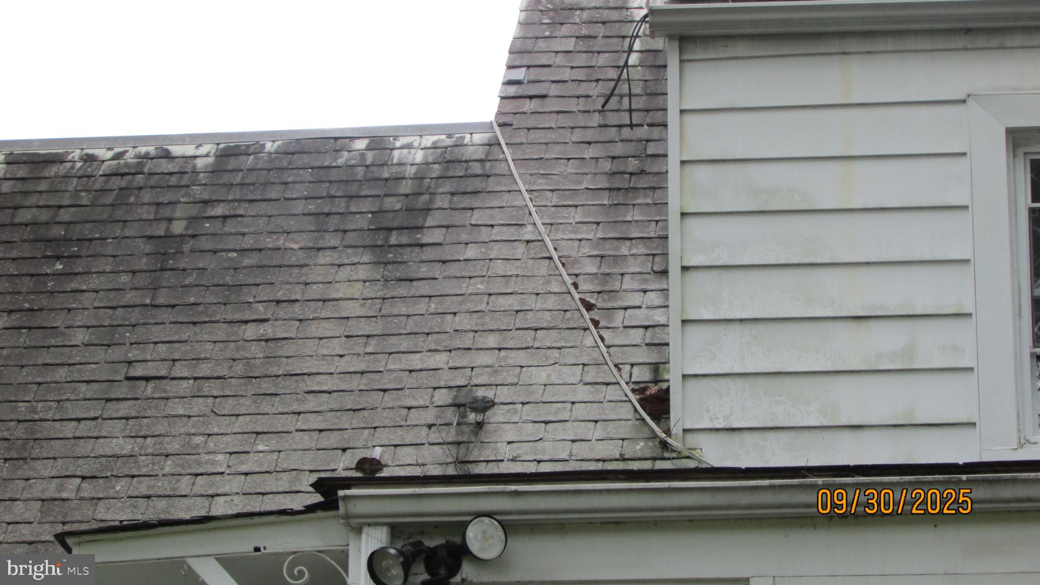 4614 Beechwood Road College Park, MD 20740 - Photo 7 of 11 Roofline showing wear and weathering details.