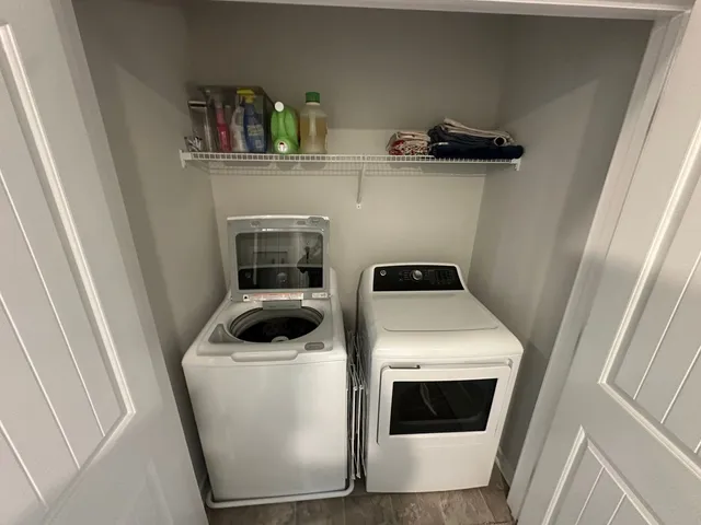 a utility room with dryer and washer