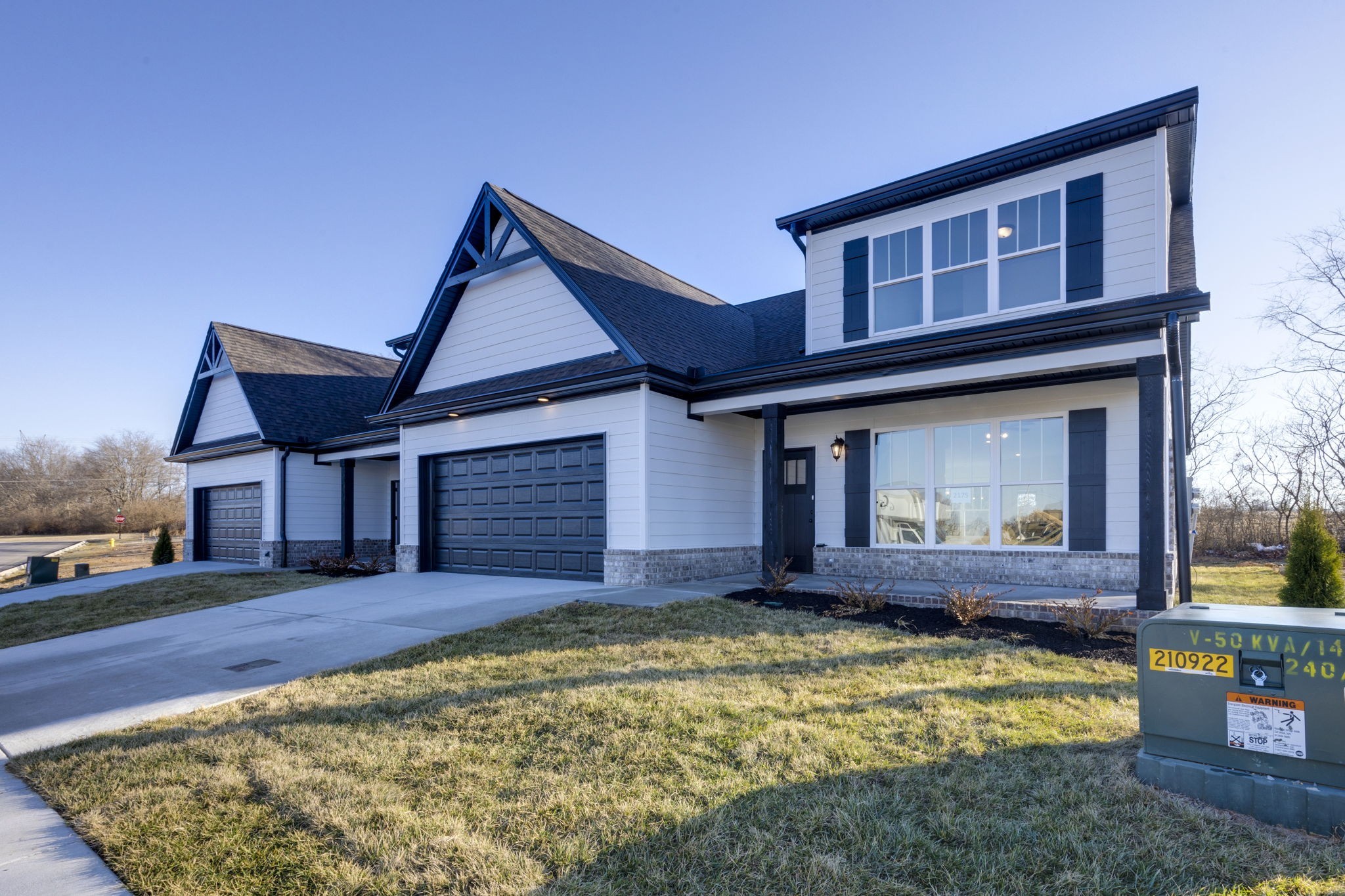 2175 Rylee Way Greenbrier, TN 37073 - Photo 2 of 17 a front view of a house with a yard