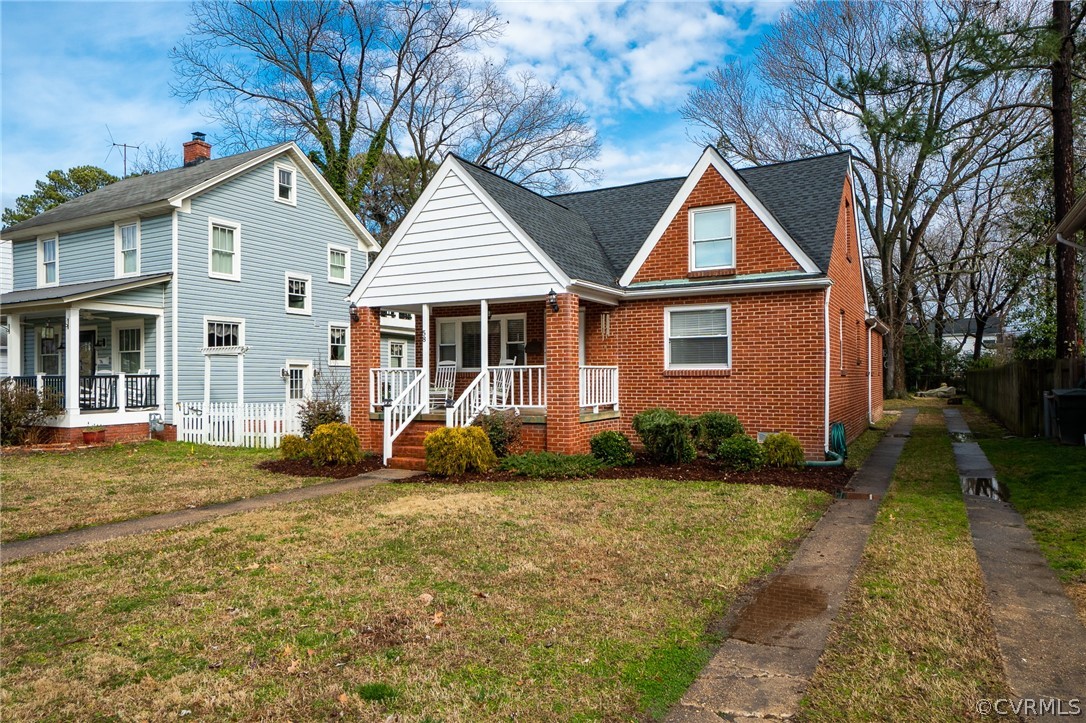 58 Alleghany Road Hampton, VA 23661 - Photo 2 of 39 a front view of a house with garden