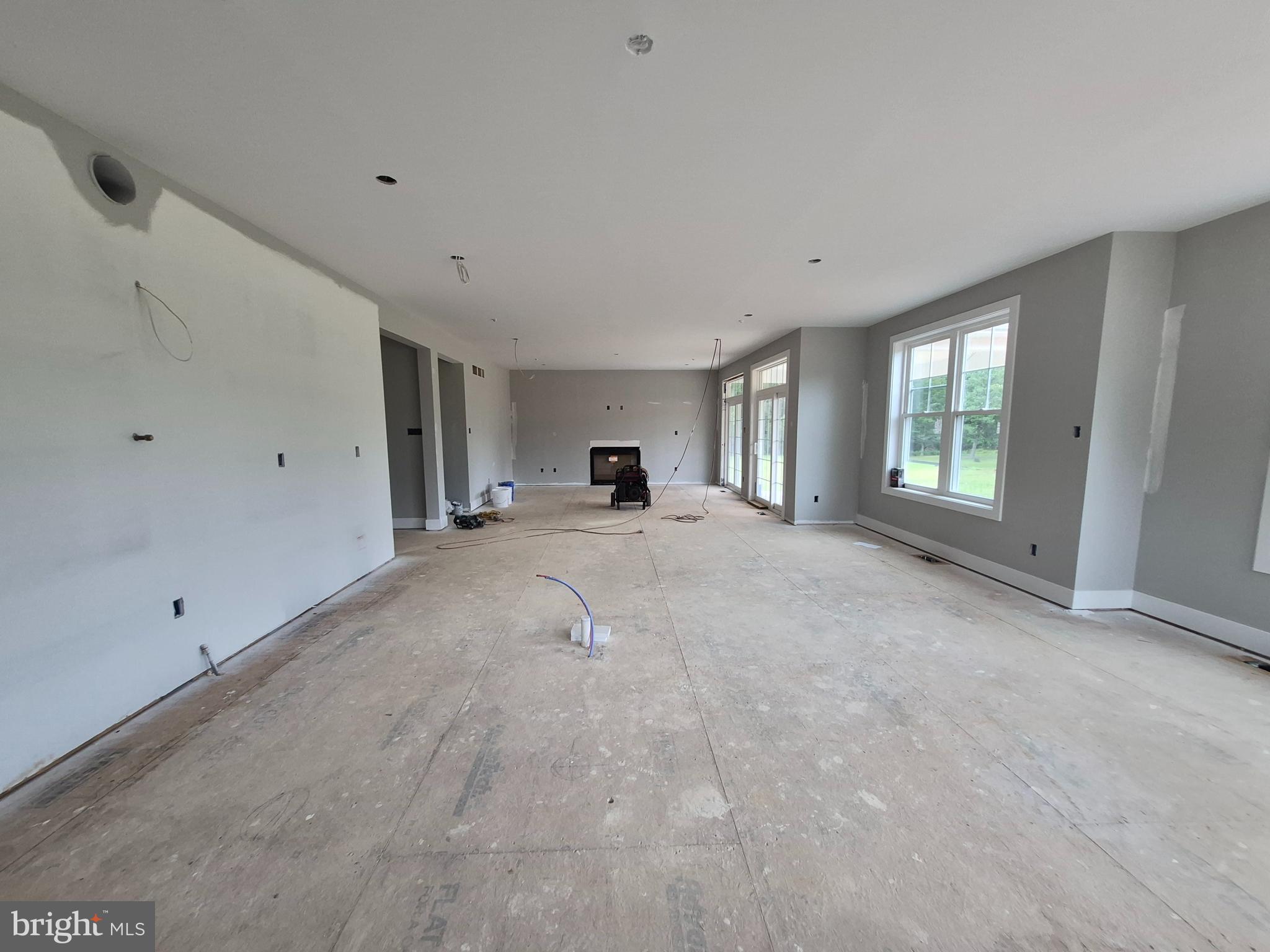 324 Bishop Hollow Road Newtown Square, PA 19073 - Photo 9 of 37 a view of a room with large windows