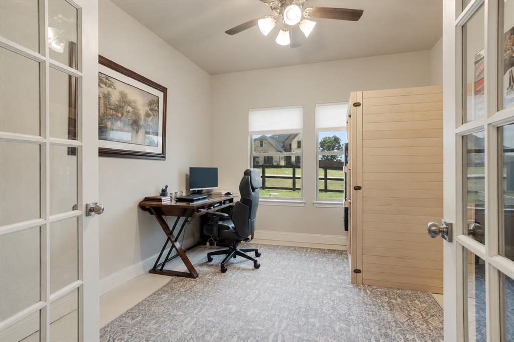 1205 Redbud Street Howe, TX 75459 - Photo 21 of 40 a view of a workspace with furniture and a window