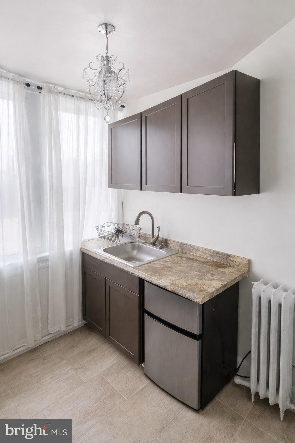 1122 Columbia Road Northwest Washington, DC 20009 - Photo 25 of 42 Third level kitchenette/wet-bar