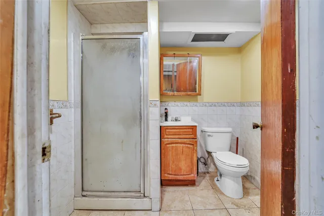a view of a chair and table in the patio