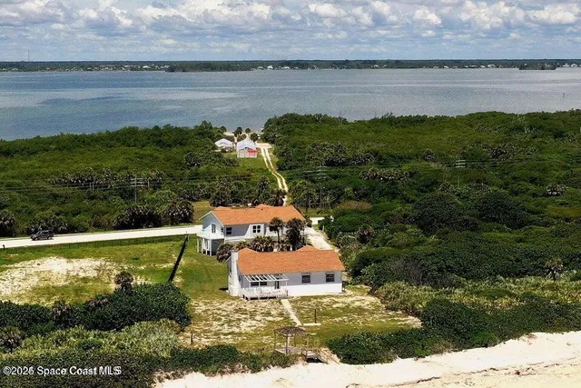 a view of a lake from a yard