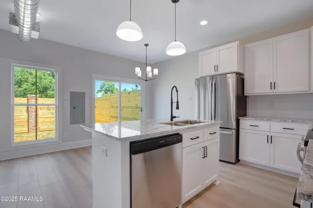 $297,500 | 424 Eraste Landry Road, Lafayette, LA 70506