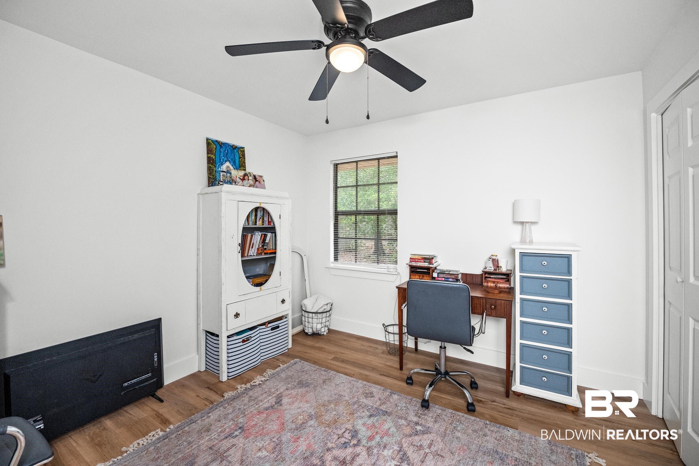 6 Wren Circle Foley, AL 36535 - Photo 39 of 55 Office area featuring ceiling fan, baseboards, and wood finished floors