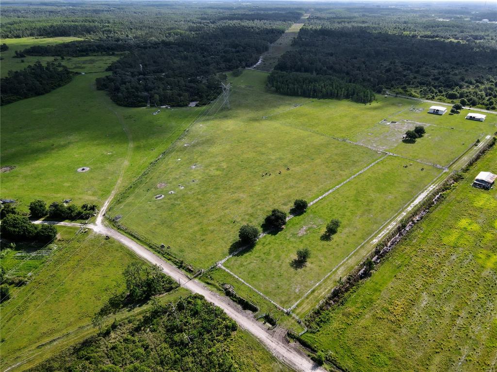 5394 8 Mile Ranch Road St. Cloud, FL 34773 - Photo 1 of 1 20 fenced acres with electric, water, and buildings.