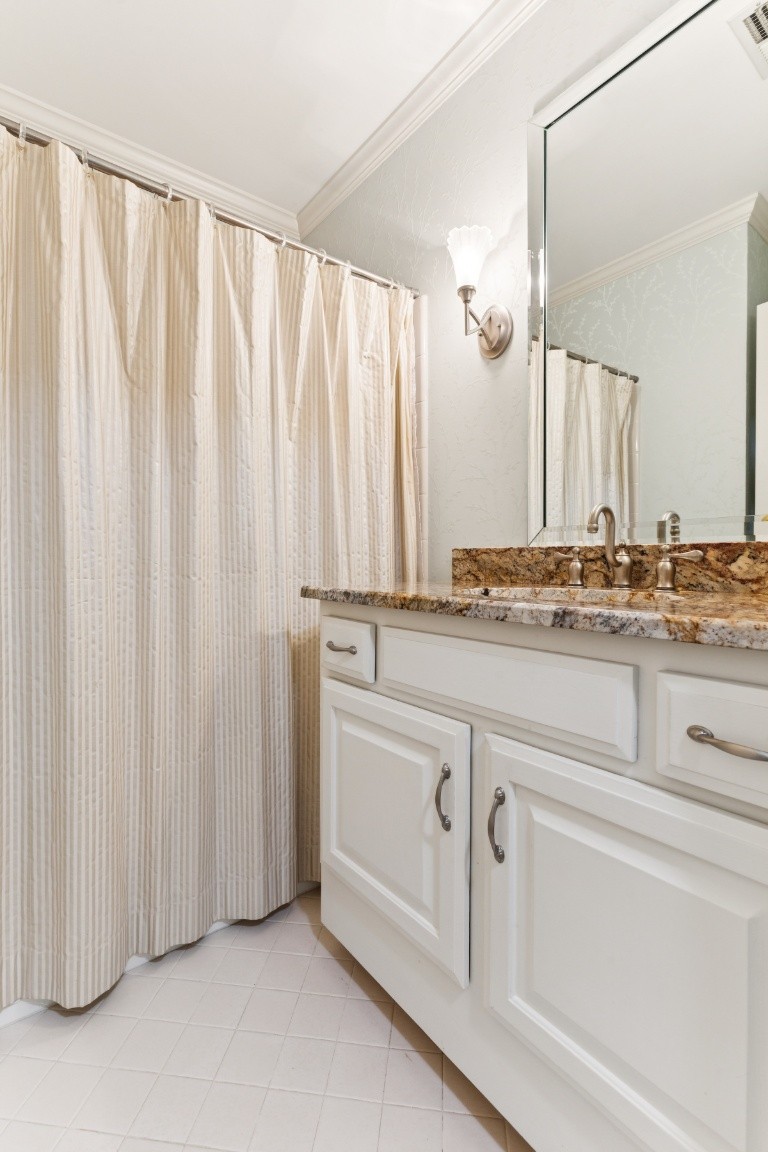 509 General George Patton Road Nashville, TN 37221 - Photo 13 of 25 a bathroom with a sink and a mirror