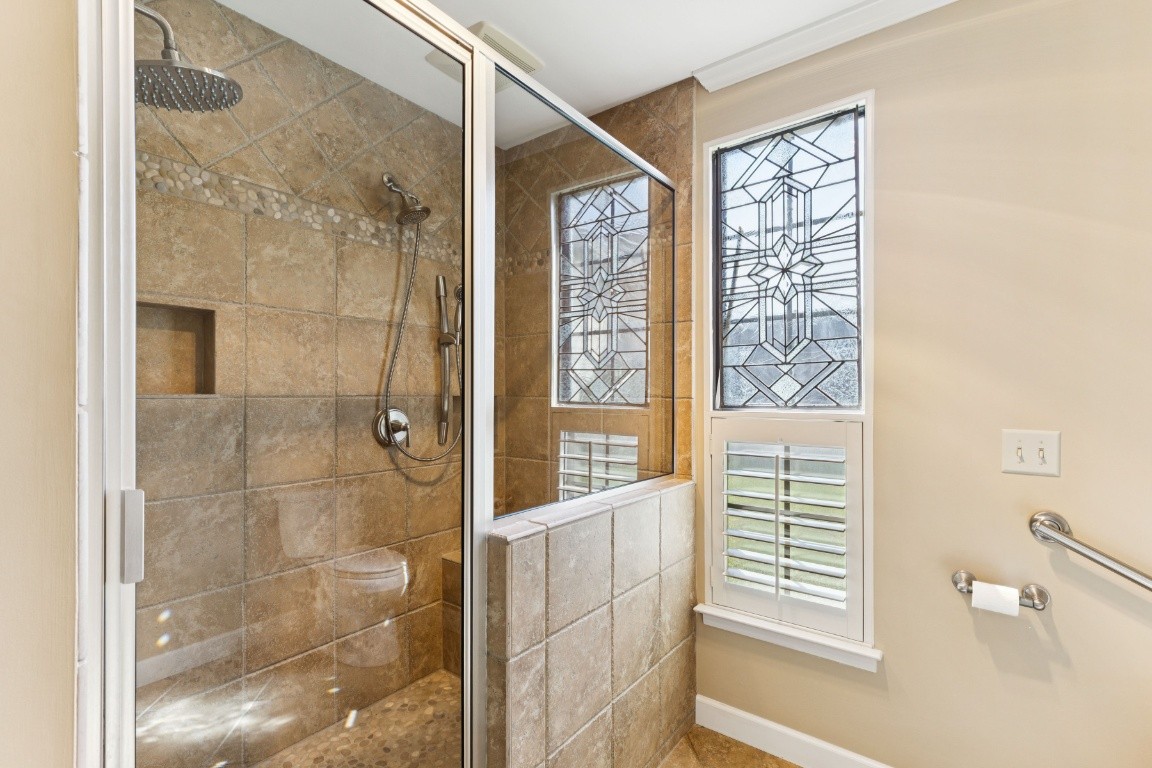 509 General George Patton Road Nashville, TN 37221 - Photo 19 of 25 a bathroom with a shower and a toilet