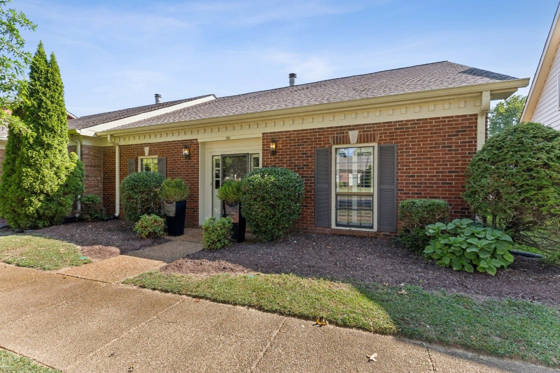 509 General George Patton Road Nashville, TN 37221 - Photo 2 of 25 front view of a house with a small yard