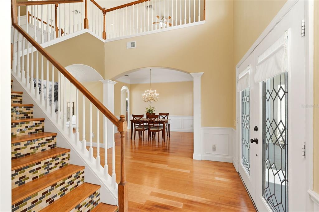936 Kingsridge Circle Gotha, FL 34734 - Photo 42 of 50 a view of a hallway with wooden floor and staircase