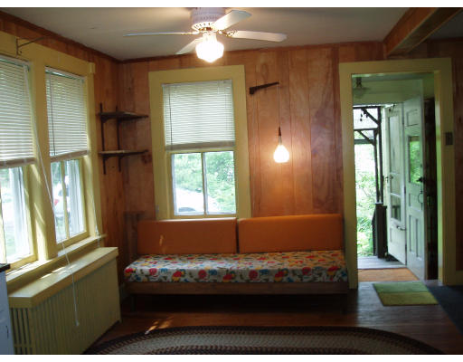 47 Route 20 Chester, MA 01011 - Photo 11 of 19 a bedroom with bed and window