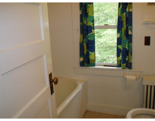 47 Route 20 Chester, MA 01011 - Photo 14 of 19 a bathroom with a bathtub and sink