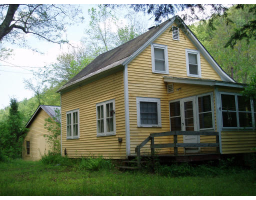 47 Route 20 Chester, MA 01011 - Photo 2 of 19 a view of front of a house with a yard