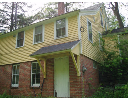 47 Route 20 Chester, MA 01011 - Photo 4 of 19 a view of a house with a yard