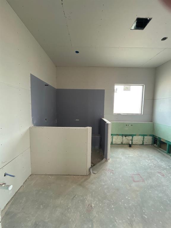 811 Vly Rdg Road Van Alstyne, TX 75495 - Photo 12 of 15 an empty room with windows