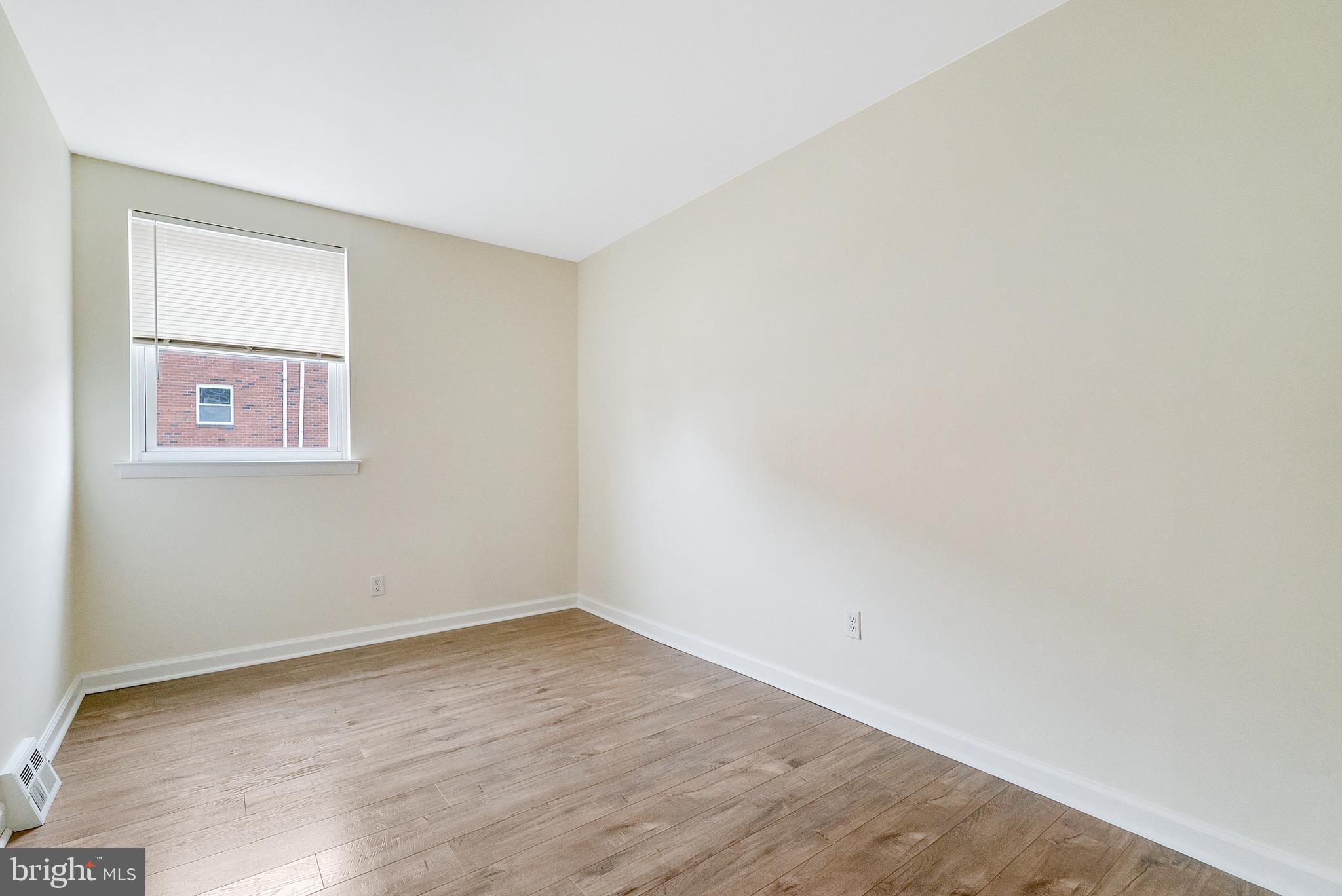 9754 East Roosevelt Boulevard, Unit 1 Philadelphia, PA 19115 - Photo 19 of 30 an empty room with a window