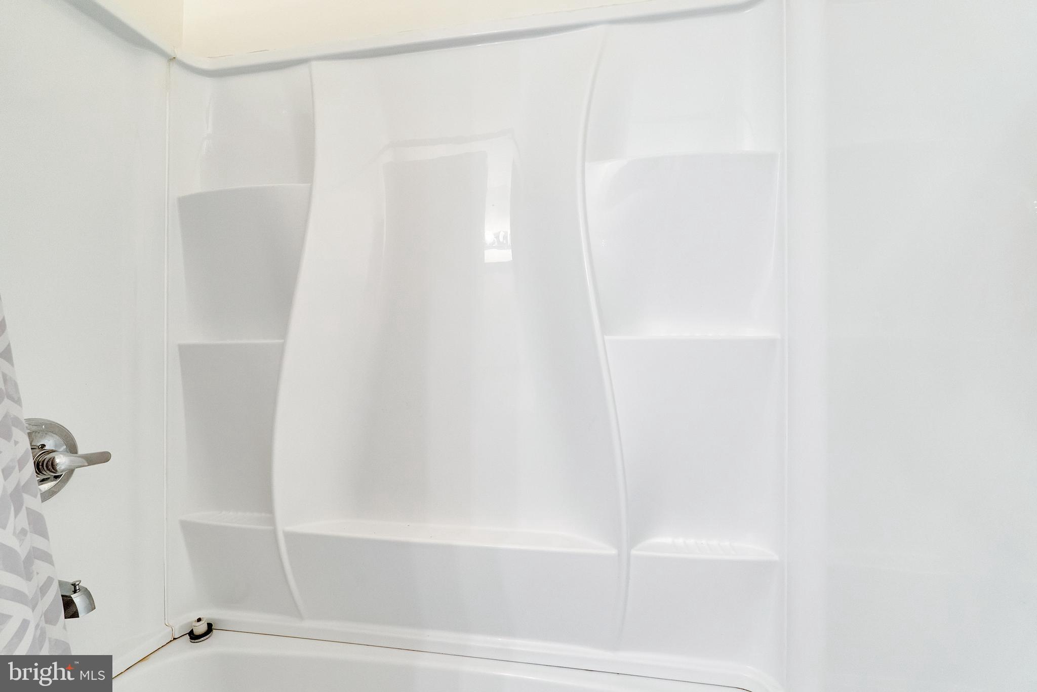 9754 East Roosevelt Boulevard, Unit 1 Philadelphia, PA 19115 - Photo 21 of 30 a bathroom with a bathtub