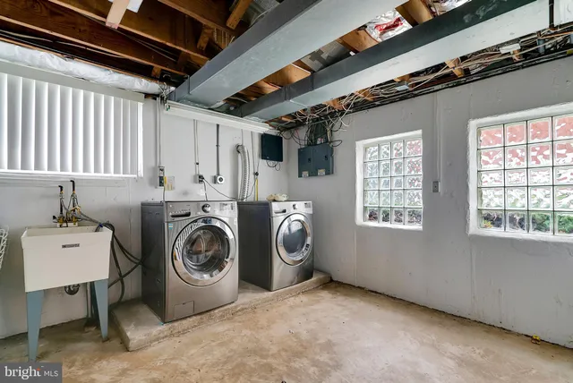 a utility room with dryer and washer