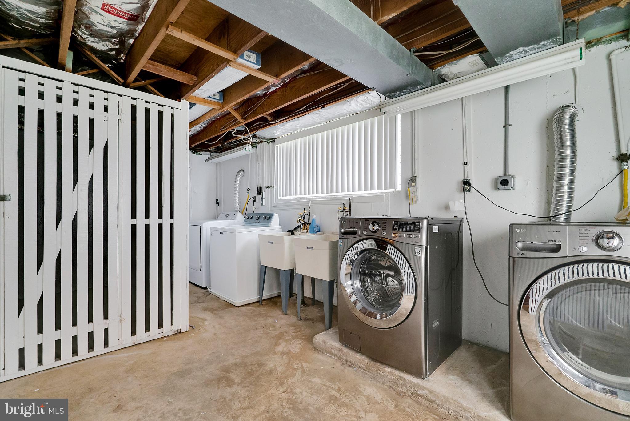 9754 East Roosevelt Boulevard, Unit 1 Philadelphia, PA 19115 - Photo 25 of 30 a utility room with dryer and washer