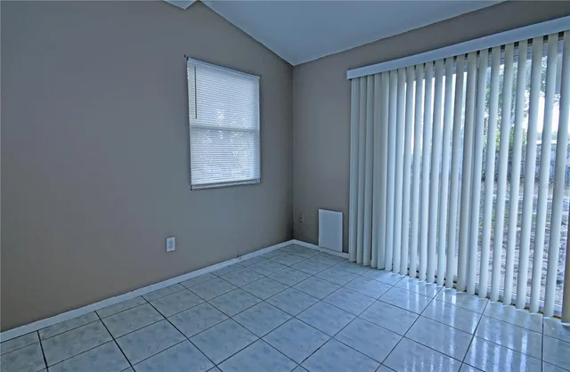 a view of an empty room with window