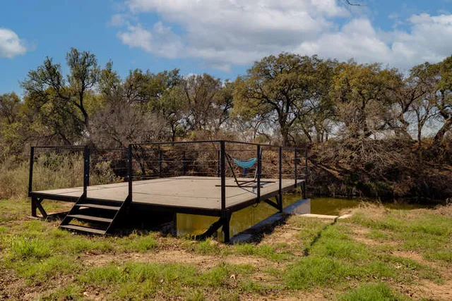 a view of a slide with sitting area