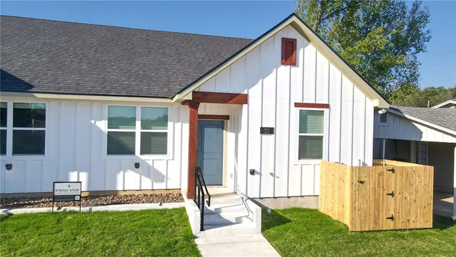 a front view of house with yard
