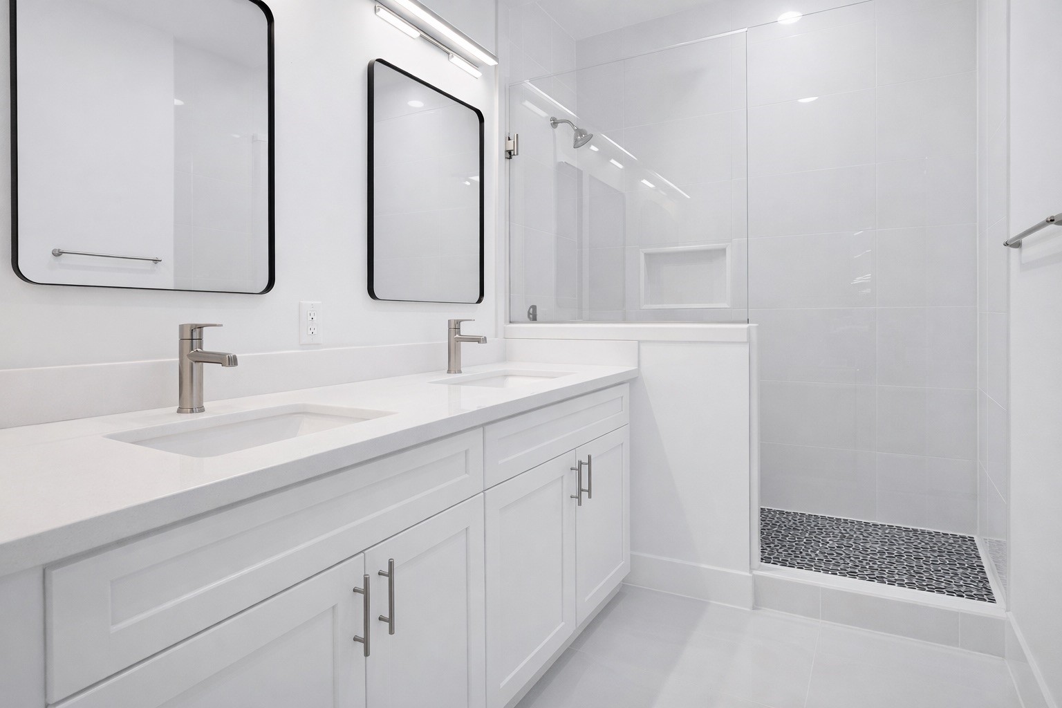 8137 Cabot Street, Unit B Houston, TX 77078 - Photo 8 of 13 a bathroom with a double vanity sink and mirror