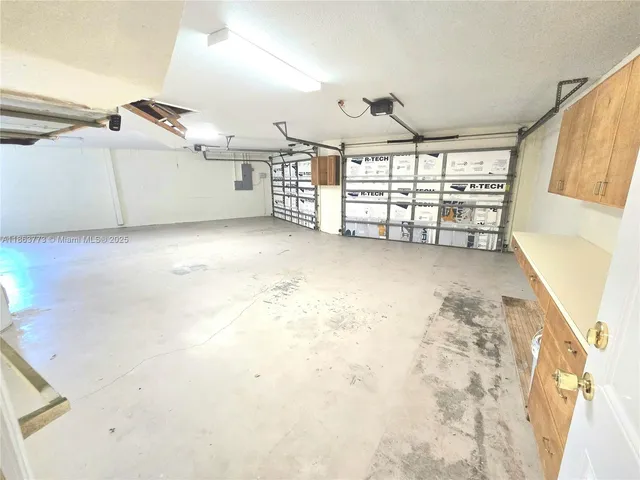 a view of a kitchen with furniture and a kitchen
