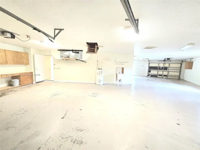a view of a kitchen with a sink