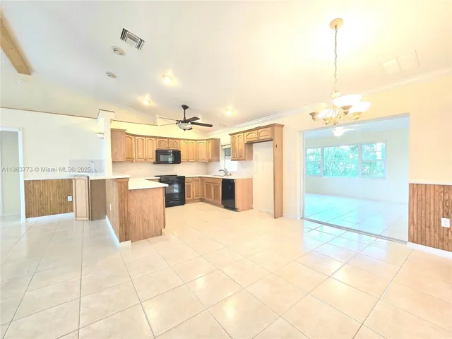 a view of a bathroom with sink and bathtub