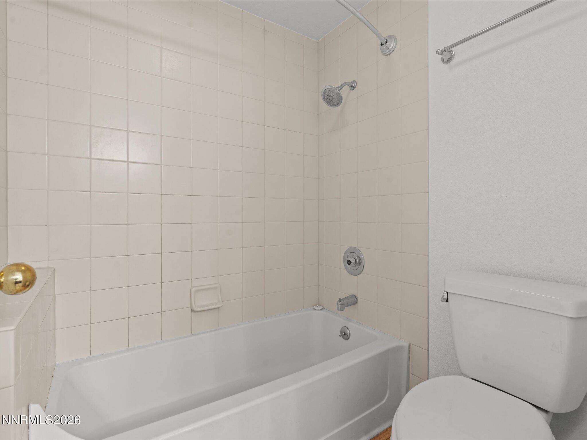 3170 Oakshire Court Reno, NV 89509 - Photo 30 of 43 a bathroom with a toilet bathtub and shower