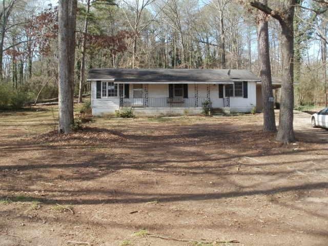 6141 Johnson Road Riverdale, GA 30274 - Photo 1 of 1 a front view of house with yard barbeque oven and trees