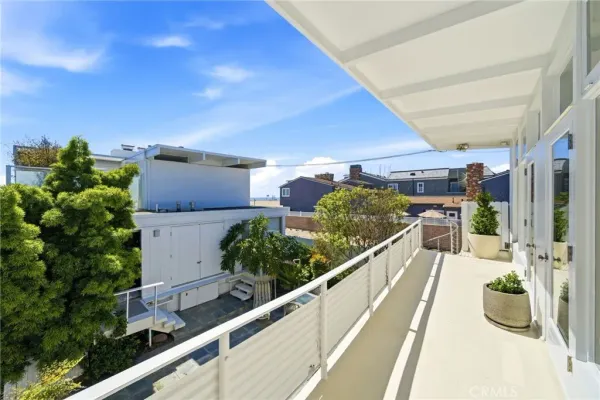 a view of balcony with furniture