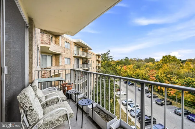 a view of balcony with furniture
