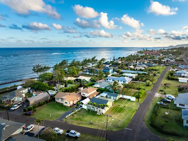 an aerial view of a house with a garden
