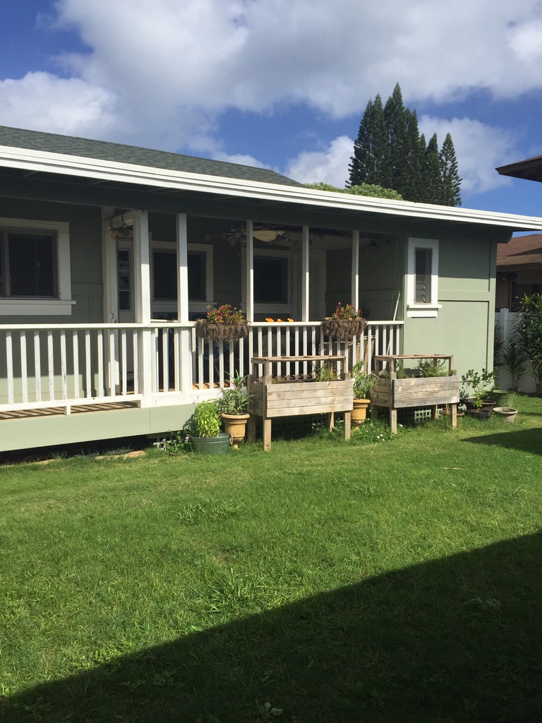 4463 Makaha Road Kapaa, HI 96746 - Photo 10 of 23 a view of a house with a yard and deck
