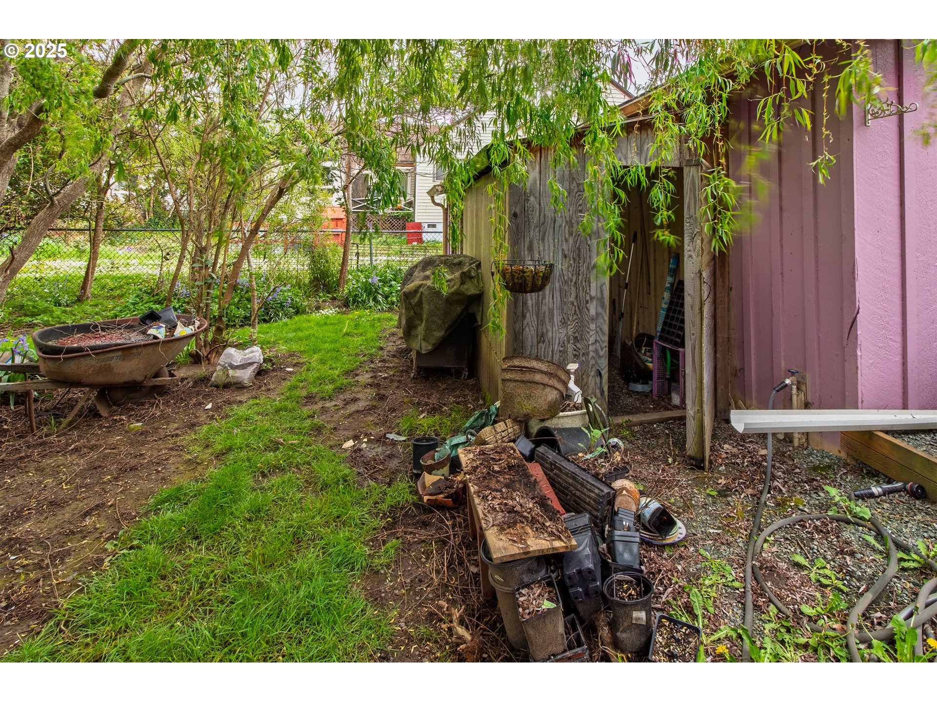 655 6th Street Myrtle Point, OR 97458 - Photo 20 of 31 a backyard of a house with barbeque oven table and chairs